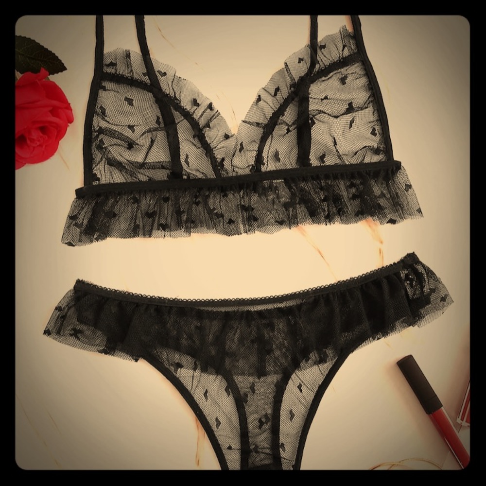 Dainty lace sexy lingerie with hearts and frills.